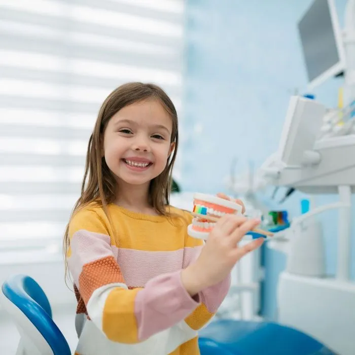 Child learning how to brush